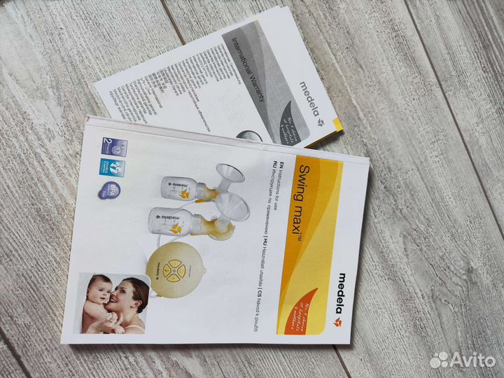 Двойной молокоотсос swing maxi medela +calma