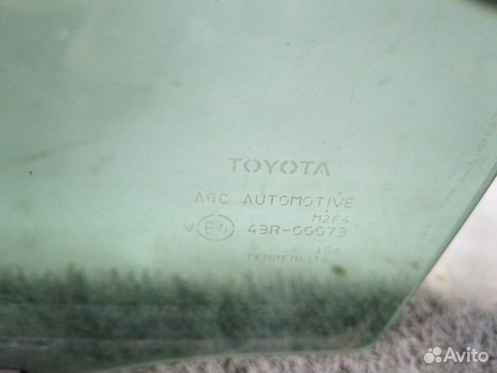 Стекло двери заднее левое Toyota Camry V70