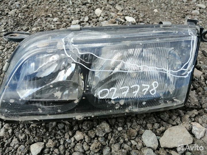 Фара левая Mazda Capella 1997-1999