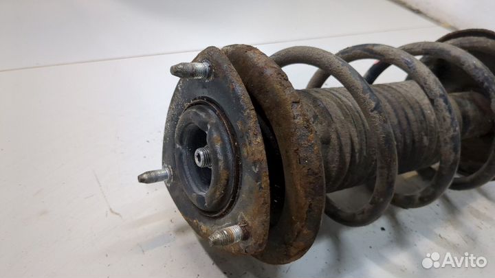 Амортизатор подвески левый передний Suzuki Grand Vitara