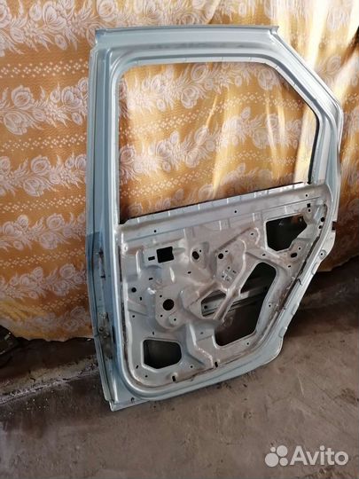 Дверь задняя правая рено логан 1