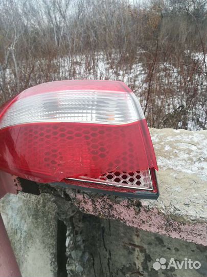 Левый задний фонарь на киа рио 3