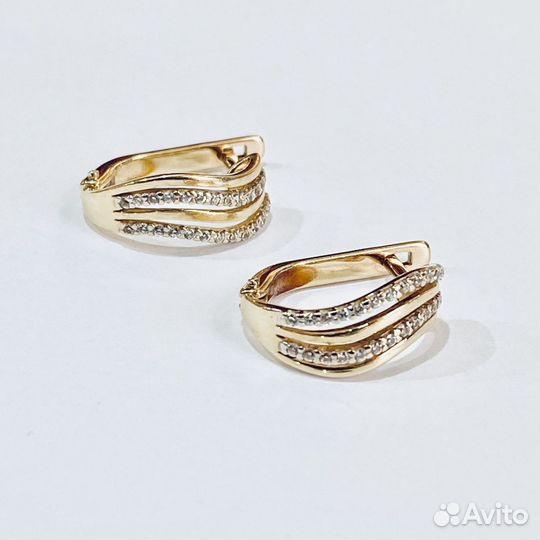 Золотые серьги с камнем