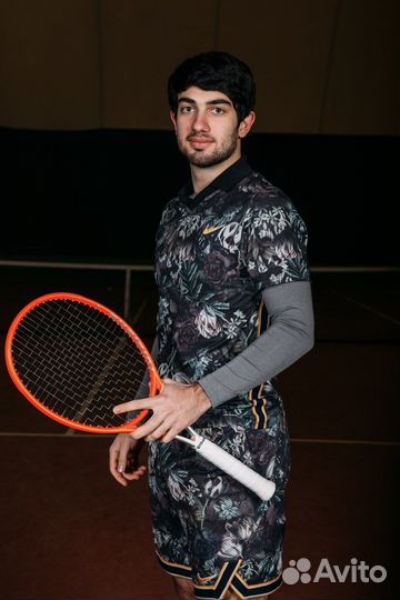 Тренер по большому теннису