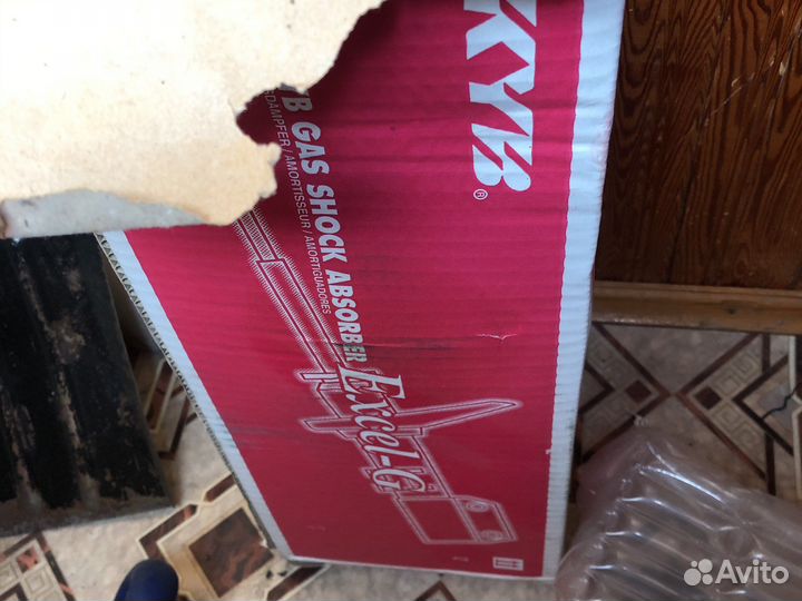 Стойка передняя левая KYB nissan x-trail T30