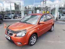 Kia Rio 1.4 AT, 2010, 146 704 км, с пробегом, цена 606 000 руб.