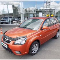 Kia Rio 1.4 AT, 2010, 146 704 км, с пробегом, цена 606 000 руб.