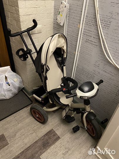 Велосипед-коляска с ручкой