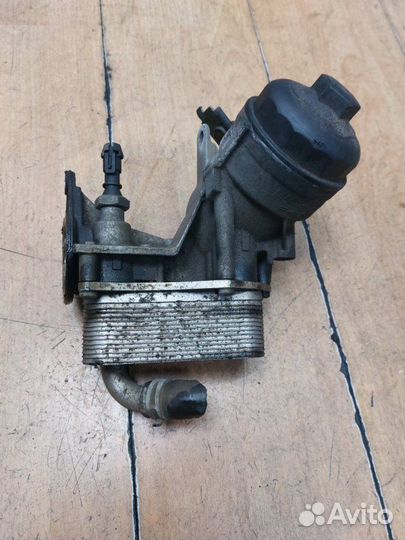 Корпус масляного фильтра Opel Zafira B A17DTR