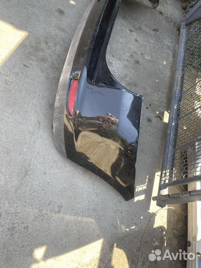 Бампер задний Mazda Demio DY D5Y15003X