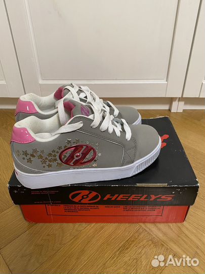 Роликовые кроссовки Heelys