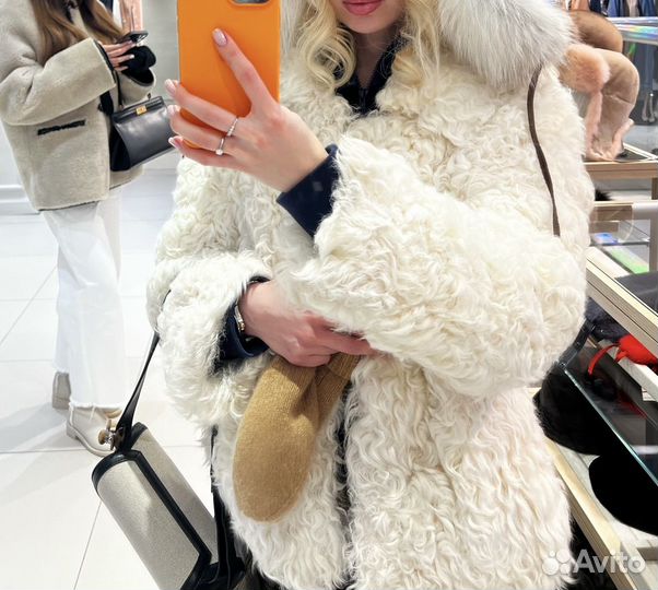 Шуба из меха тиградо