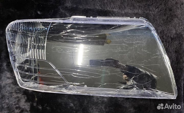 Стекло фары Паджеро 3