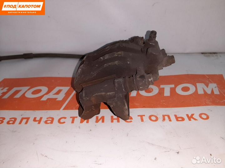 Суппорт тормозной задний левый Mazda CX-7 ER 2009