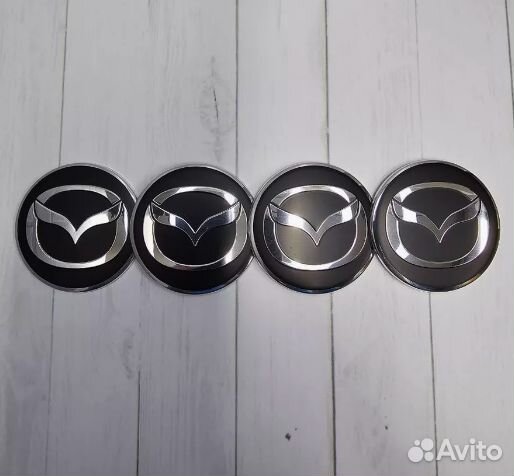 Наклейки на колпачки литых дисков Mazda