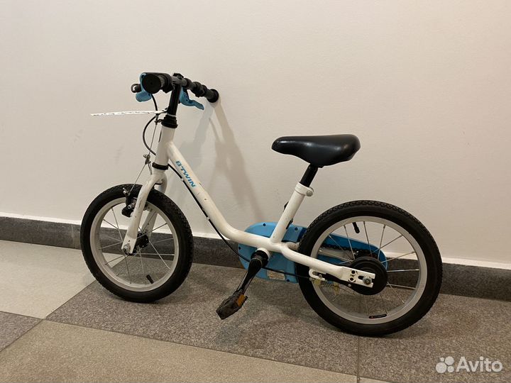 Велосипед btwin Dragon 14 с боковыми колесами