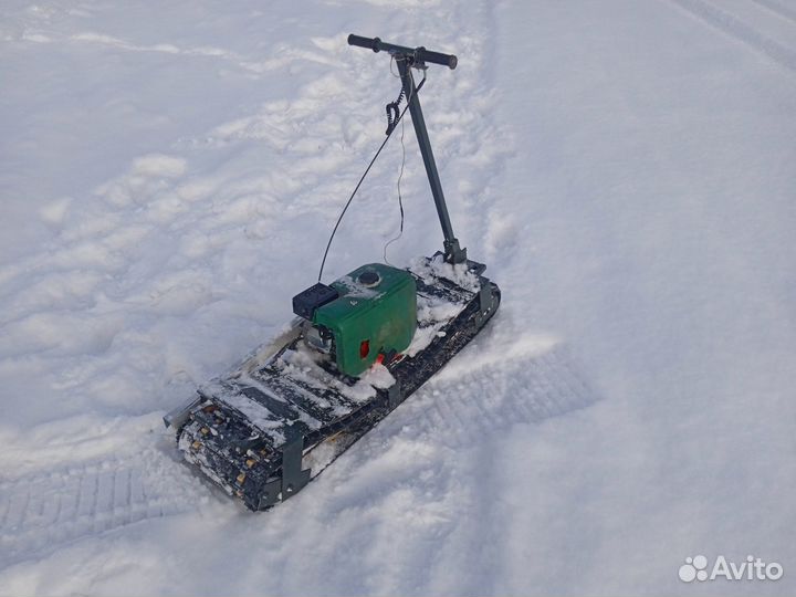 Мотосноуборд