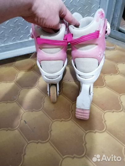 Роликовые коньки