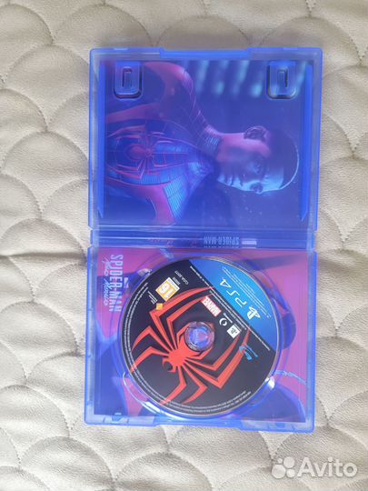 Игра на ps4 человек паук майлз моралес