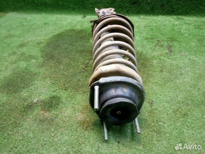 Амортизатор/стойка задняя левая Kia Spectra