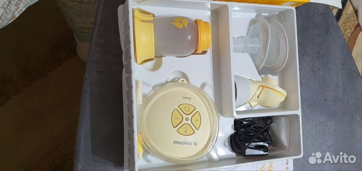 Молокоотсос medela swing flex электрический
