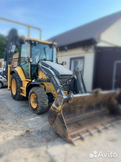 Услуги эксковатора-погрузчика