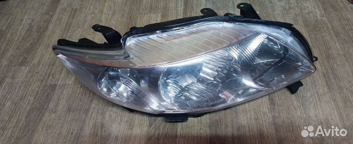 Фара правая Toyota Corolla E150