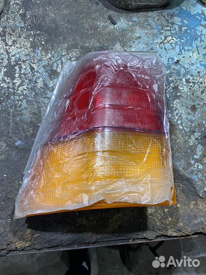 Фонарь задний левый musso