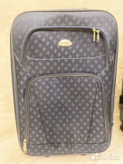 Чемодан дорожный на колесах