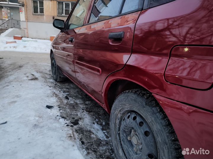 Mazda Demio 1.3 AT, 1999, 232 000 км