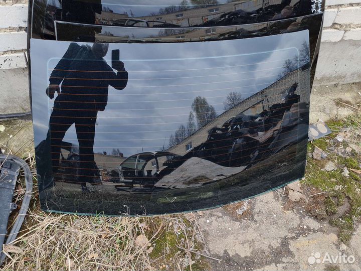 Стекло заднее Opel Astra H седан