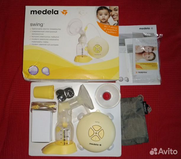 Молокоотсос Medela swing