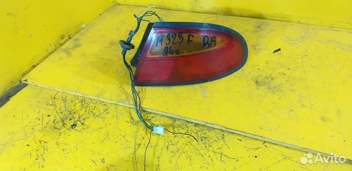 Фонарь задний правый для Mazda 323 1994г