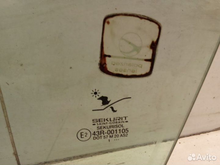 Стекло двери переднее левое Saab 9-5 седан B235