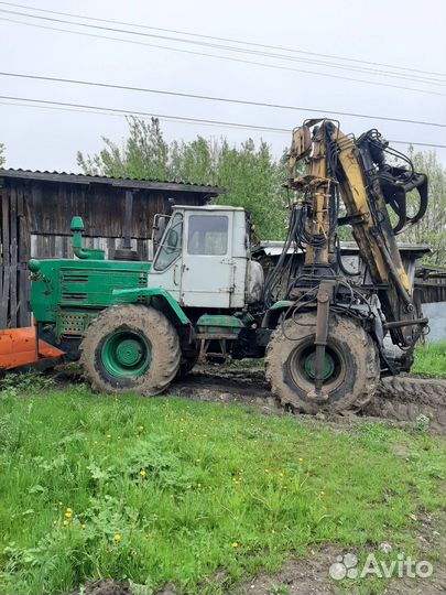 Трактор Т-150 с гидроманипулятором, навесным ножом