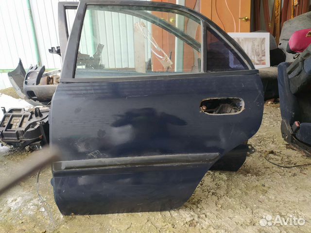 Дверь задняя Левая Mitsubishi carisma