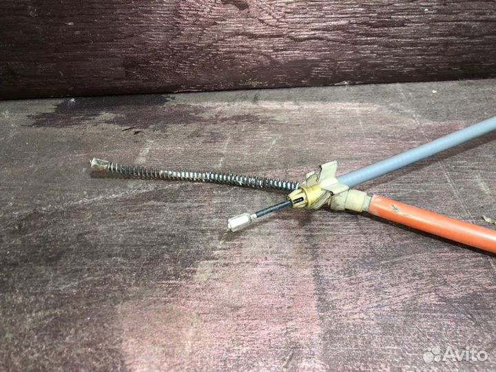 Трос стояночного тормоза Nissan Almera G15 K4M