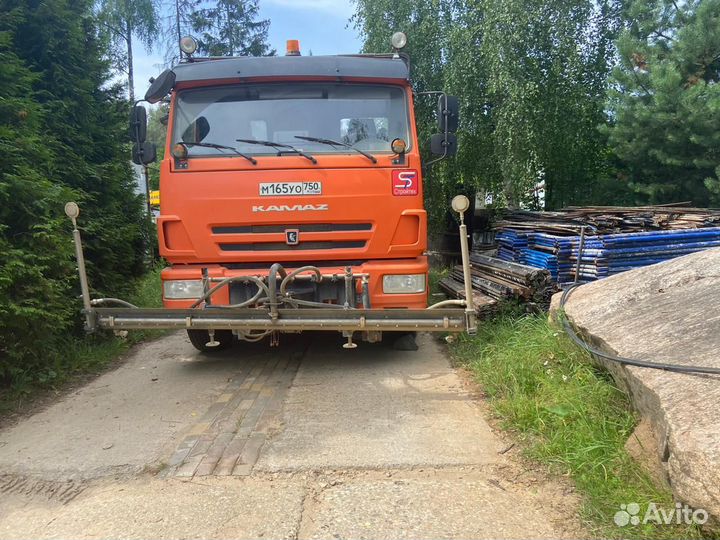 Услуга поливомоечной машины