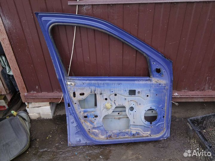 Дверь передний левый Renault Logan 1