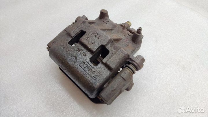 Суппорт тормозной передний левый Mazda Cx-7 ER