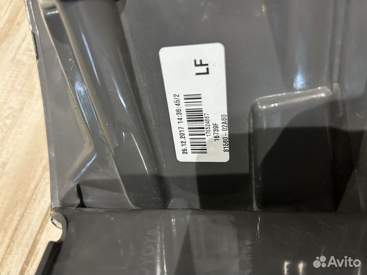 Фонарь задний Toyota Corolla 180 левый