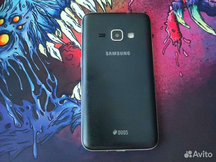 Телефон Samsung j1 2018 смартфон