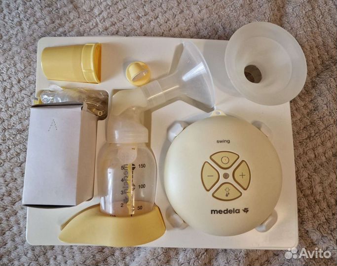 Молокоотсос medela электрический