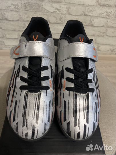 Детские футбольные бутсы