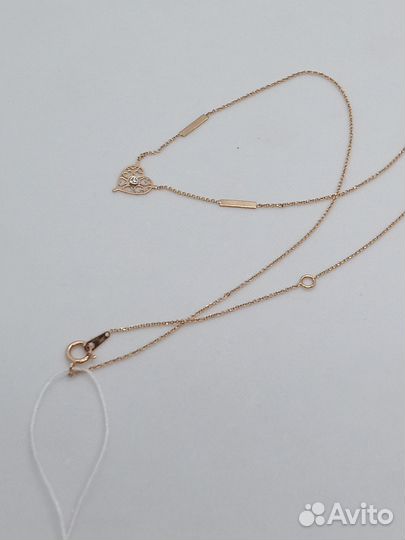 Золотое колье с камнем