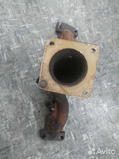 Коллектор выпускной 2.4л Додж караван Вояджер 01