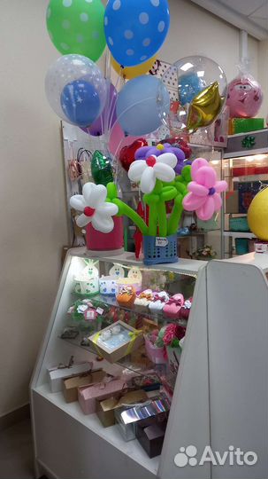 Островок упаковки подарков.Торг