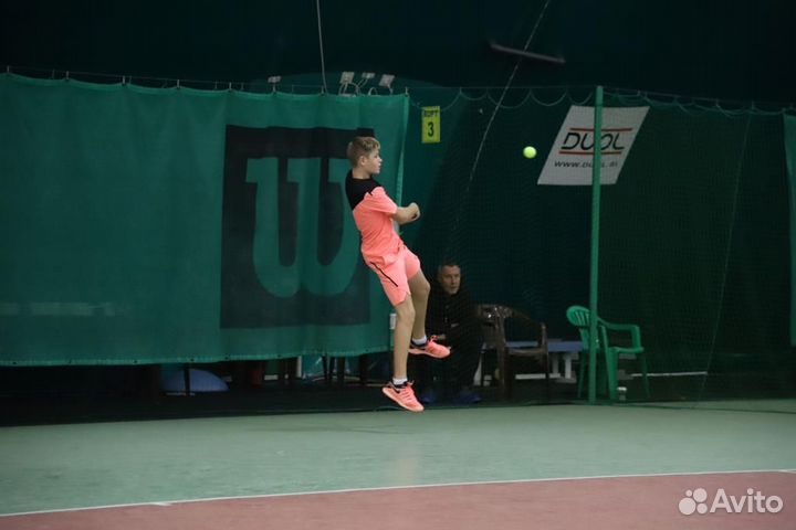 Тренер по большому теннису