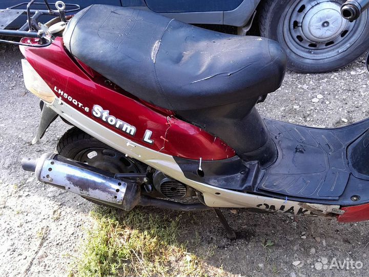 Скутер Omaks motors