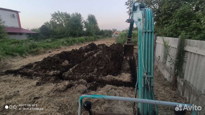 Услуги миниэкскаватора